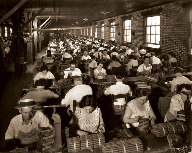A. Santaella factory workers.